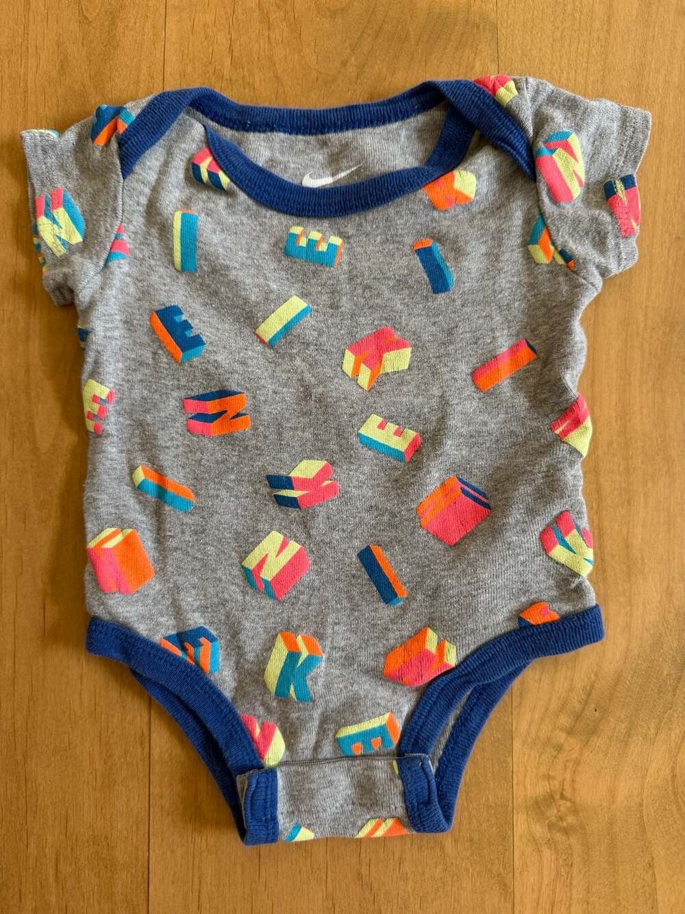 Nike Block Logo Bodysuit Size 0-6M Gray Graphic Bodysuit/One piece